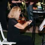 Violinist Vivian serenades guests during the ceremony